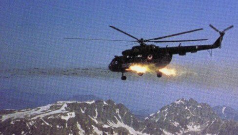 A Mi-17 fires 57 mm rockets during the initial strikes